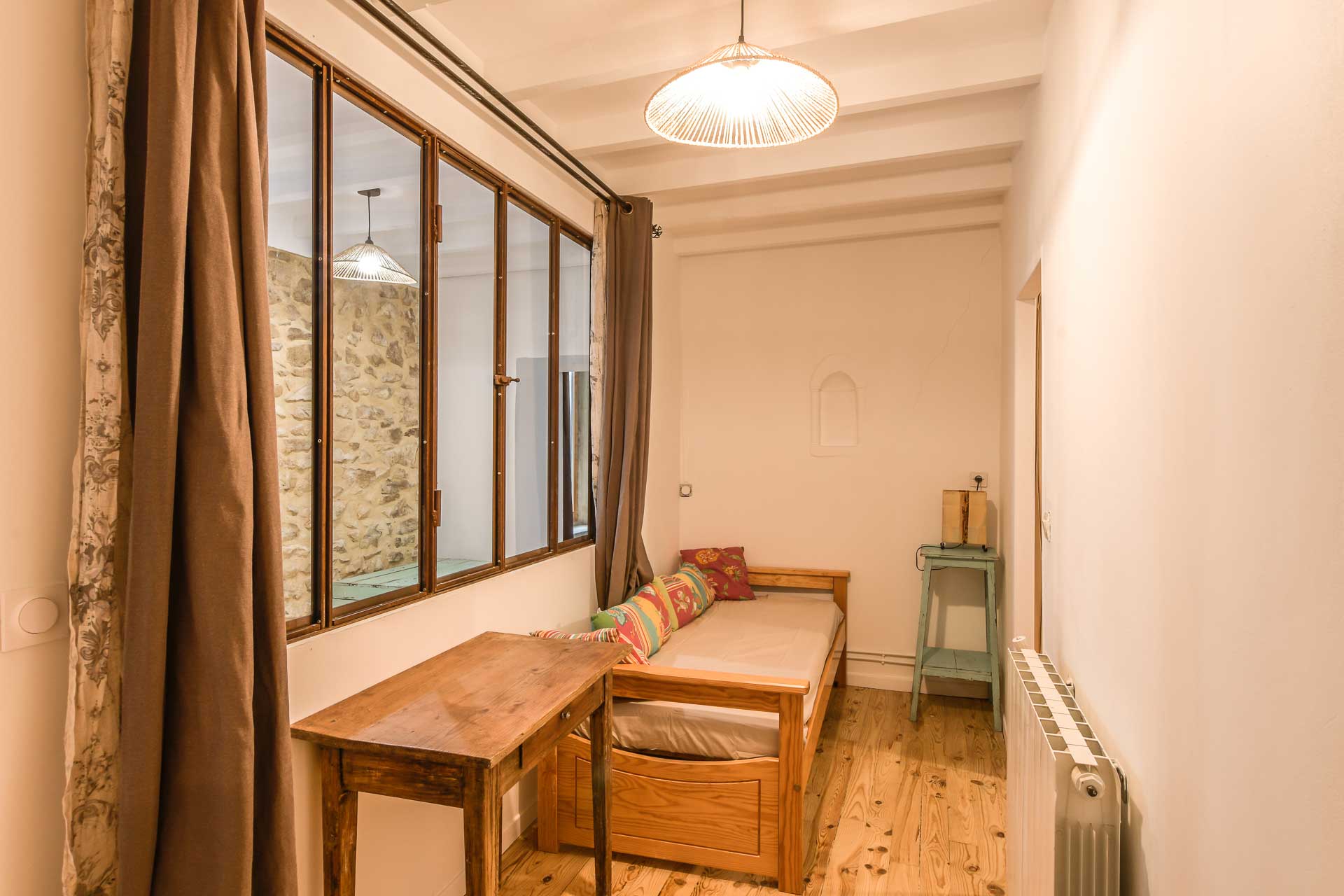 Lits simples de la chambre Cyprès